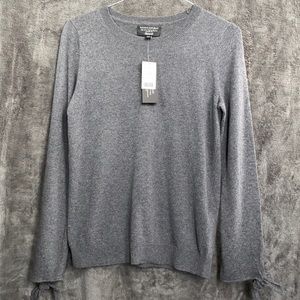 Banana Republic crew neck long sleeved sweater with tie detail on sleeve. Size S